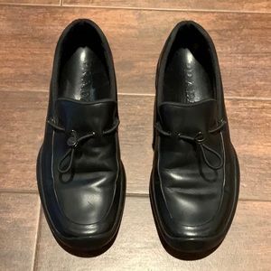Prada woman’s blk toggle loafer rubber sole size 7